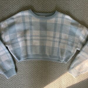 Blue and white sweater